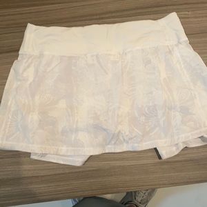 White and grey Lululemon skirt.